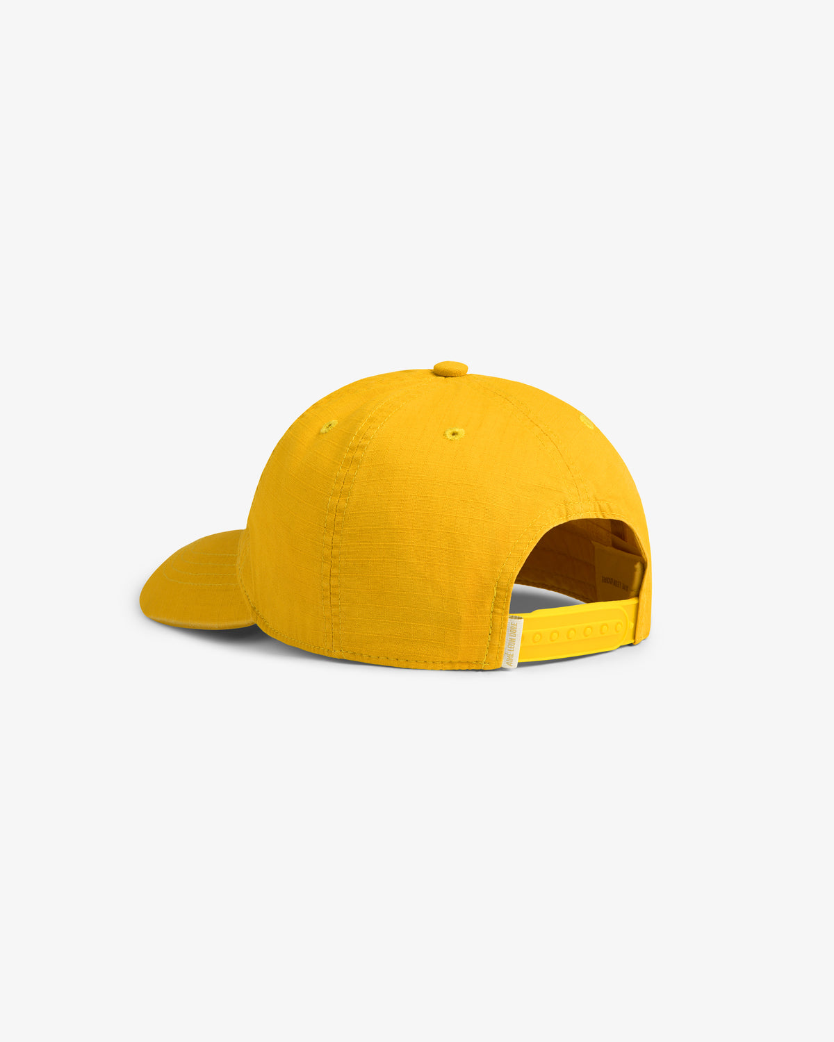 The Sun Faded Unisphere Hat in yellow features a curved brim and an adjustable strap at the back.