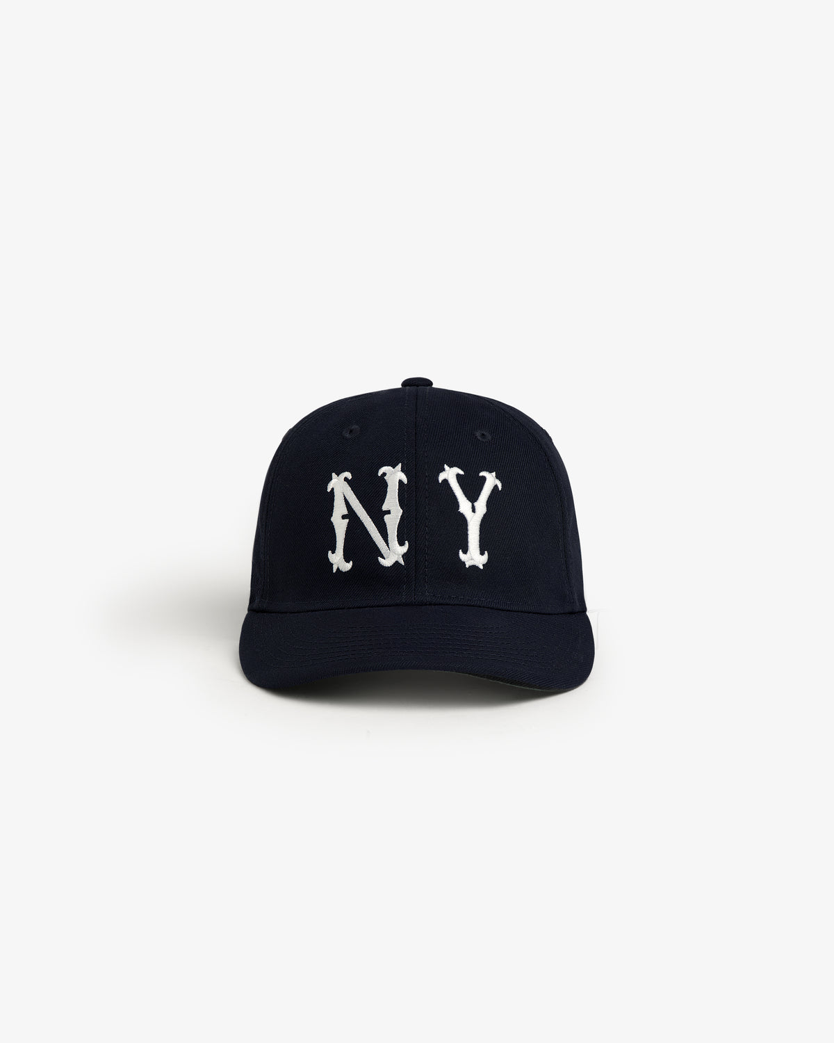 The ALD / New Era Highlanders Retro Fit Hat is a black cap with bold white NY letters on the front, shown on white.