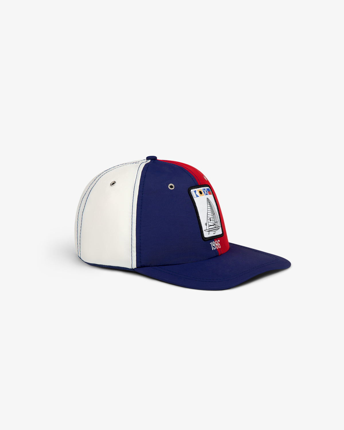 Nylon Deck Hat in blue, white, and red with sailboat patch and "1985" on the front.