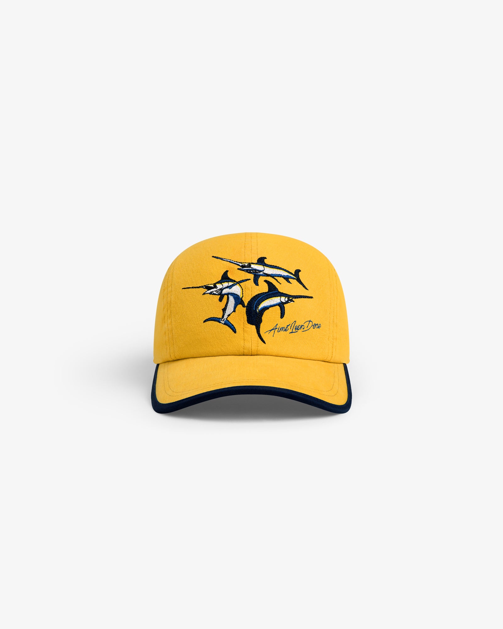 Souvenir Fishing Hat: yellow cap with embroidered swordfish, stylized signature, and black-accented brim.