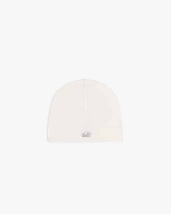 ALD Golf Skull Cap in off-white with a small oval silver logo patch on the front, shown on a white background.