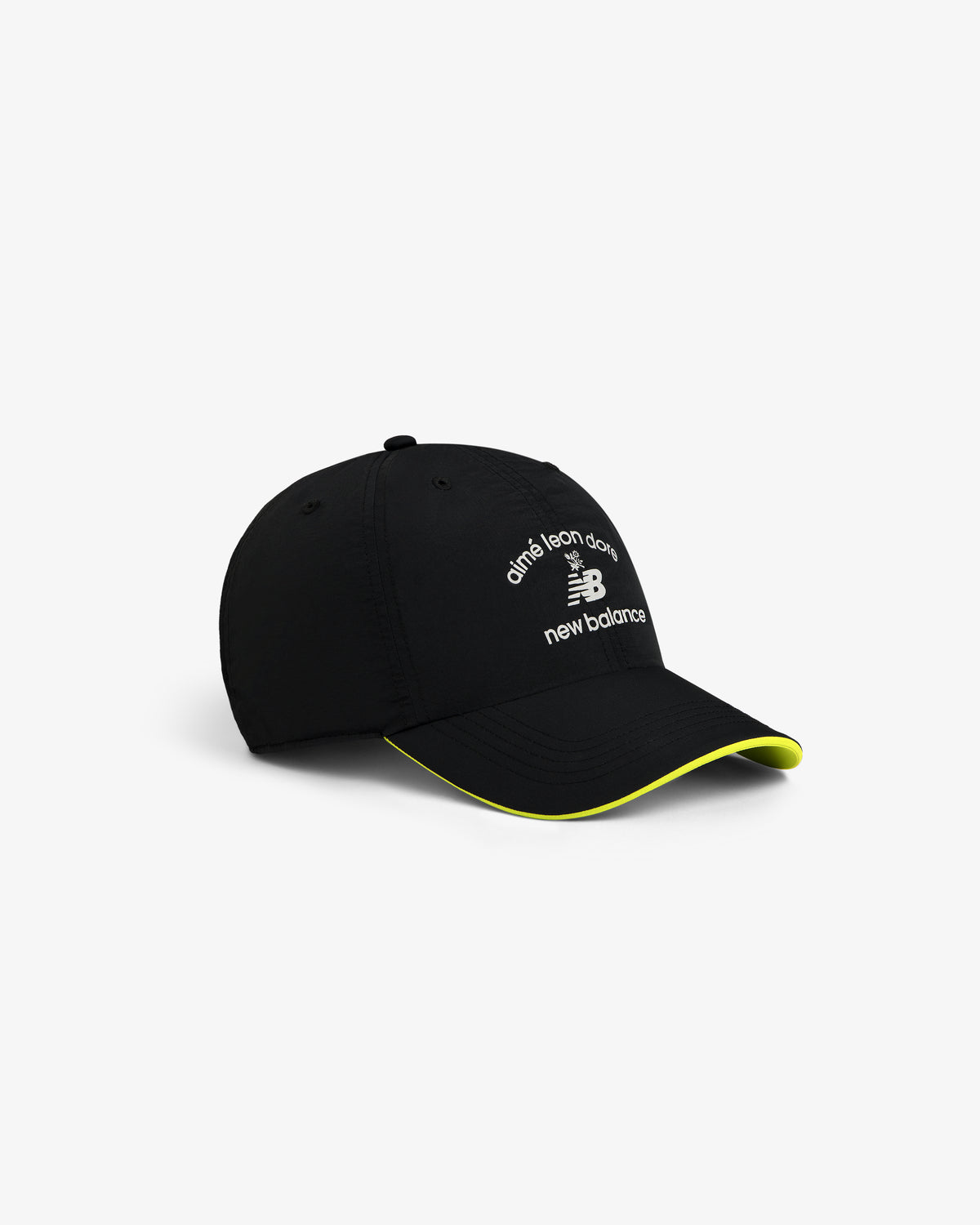 Black ALD / New Balance Running Hat with white logo and yellow trim on the curved brim, shown on a white background.