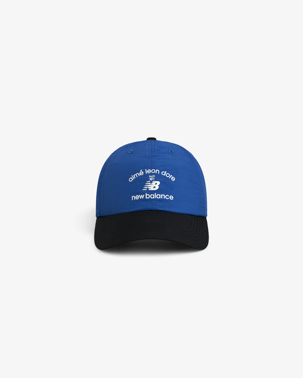 Blue and black ALD / New Balance Running Hat with white logos on the front.