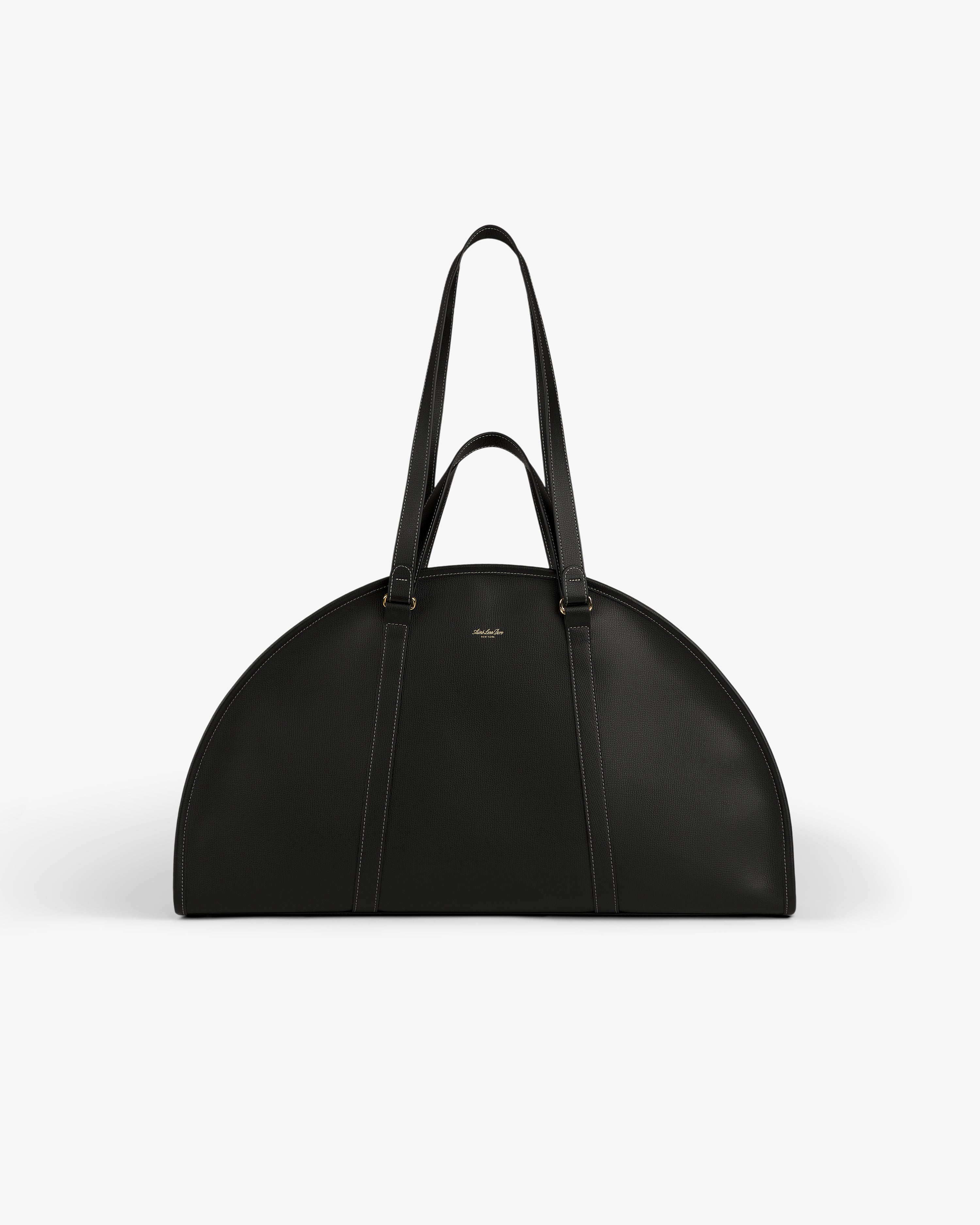 A black Full Grain Leather Weekender Bag with two handles, semi-circular shape, on a plain white background.
