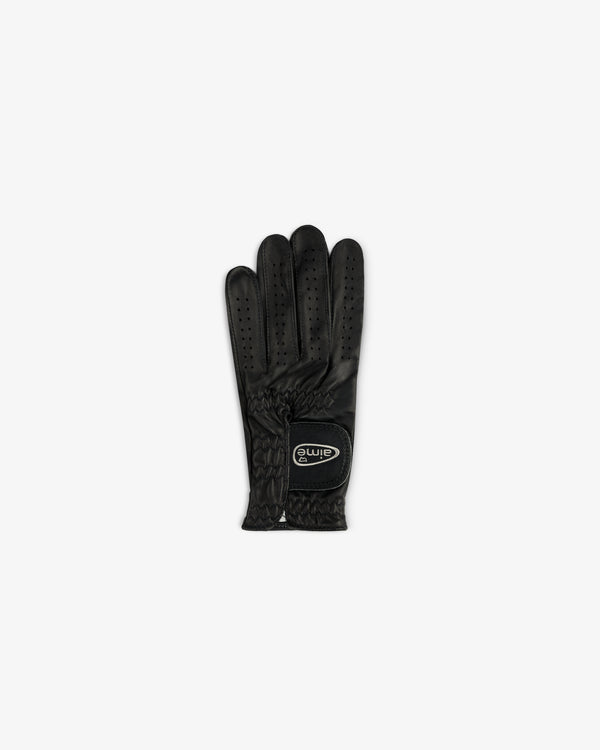 The ALD / FootJoy StaSof Heritage Glove (Left) is black with ventilation holes and a wrist logo patch.