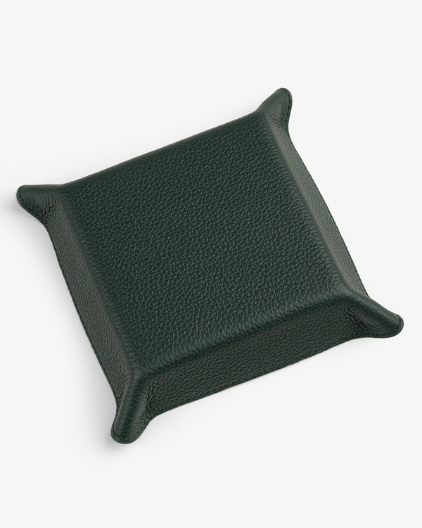 A square, dark green Leather Catchall tray with raised, pointed corners on a white background.