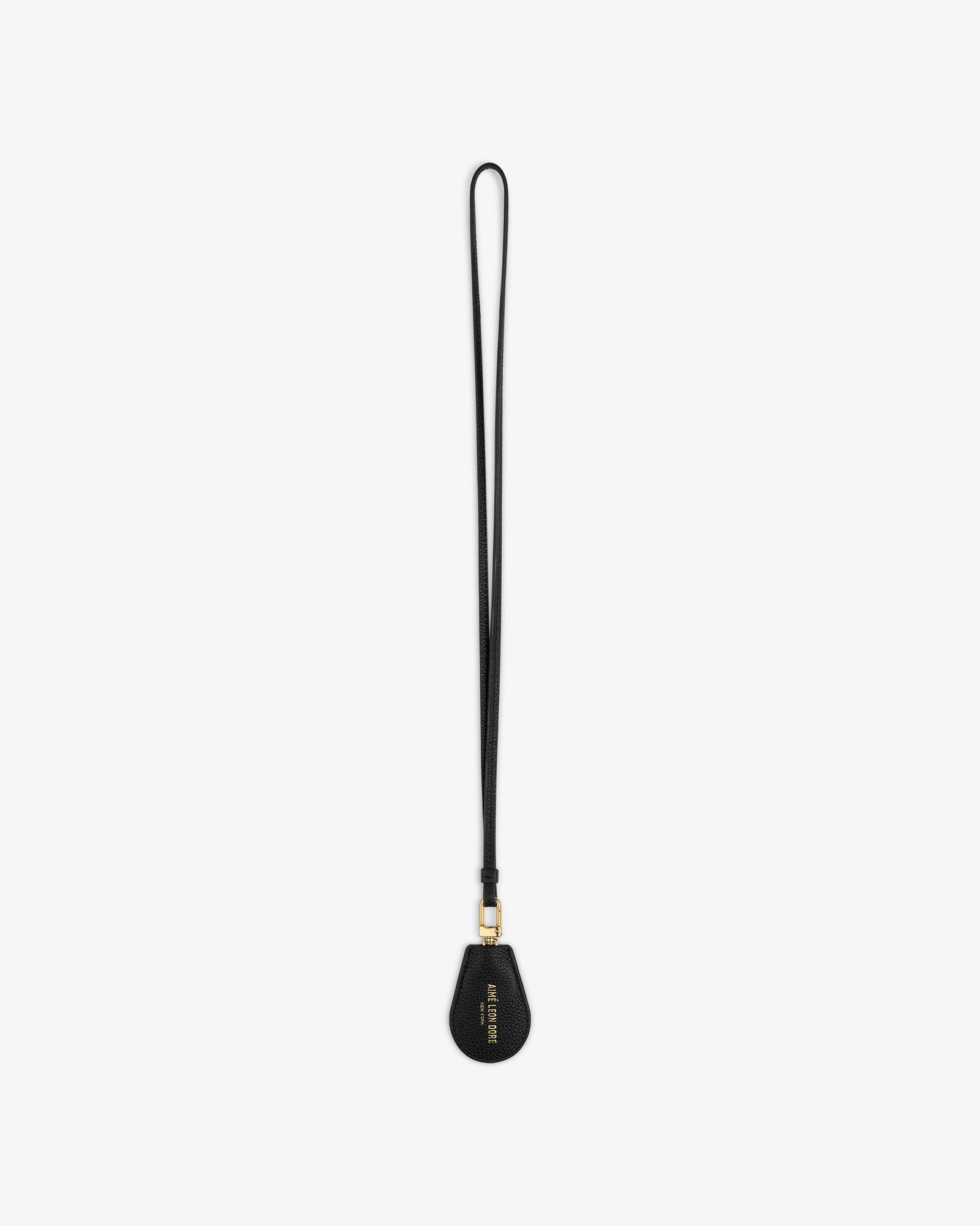 Black Leather Key Cover by Louis Vuitton with gold hardware and wrist strap, shown on a white background.