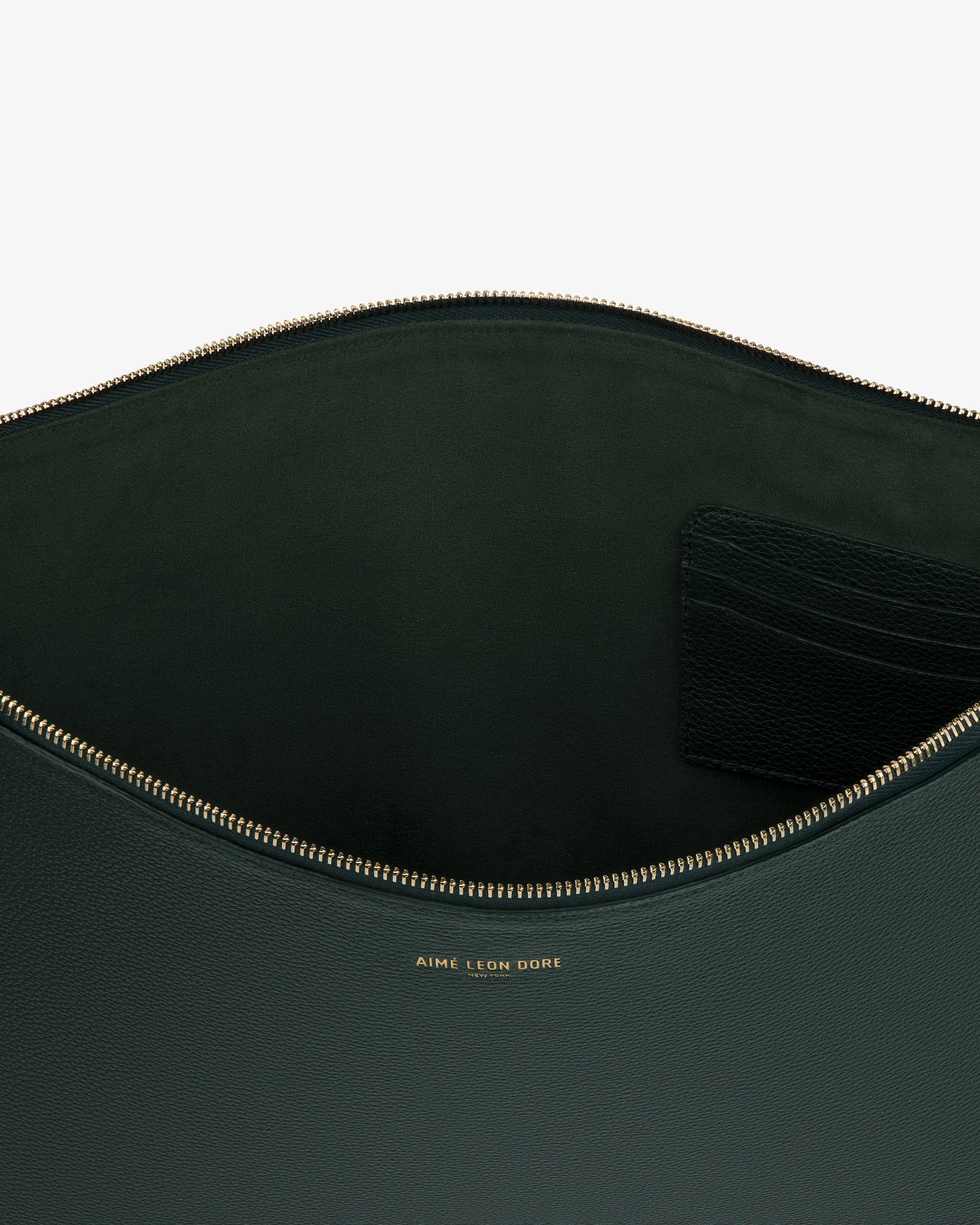 Large Leather Pouch in dark green leather with gold zipper, interior pocket, and gold Aime Leon Dore logo.