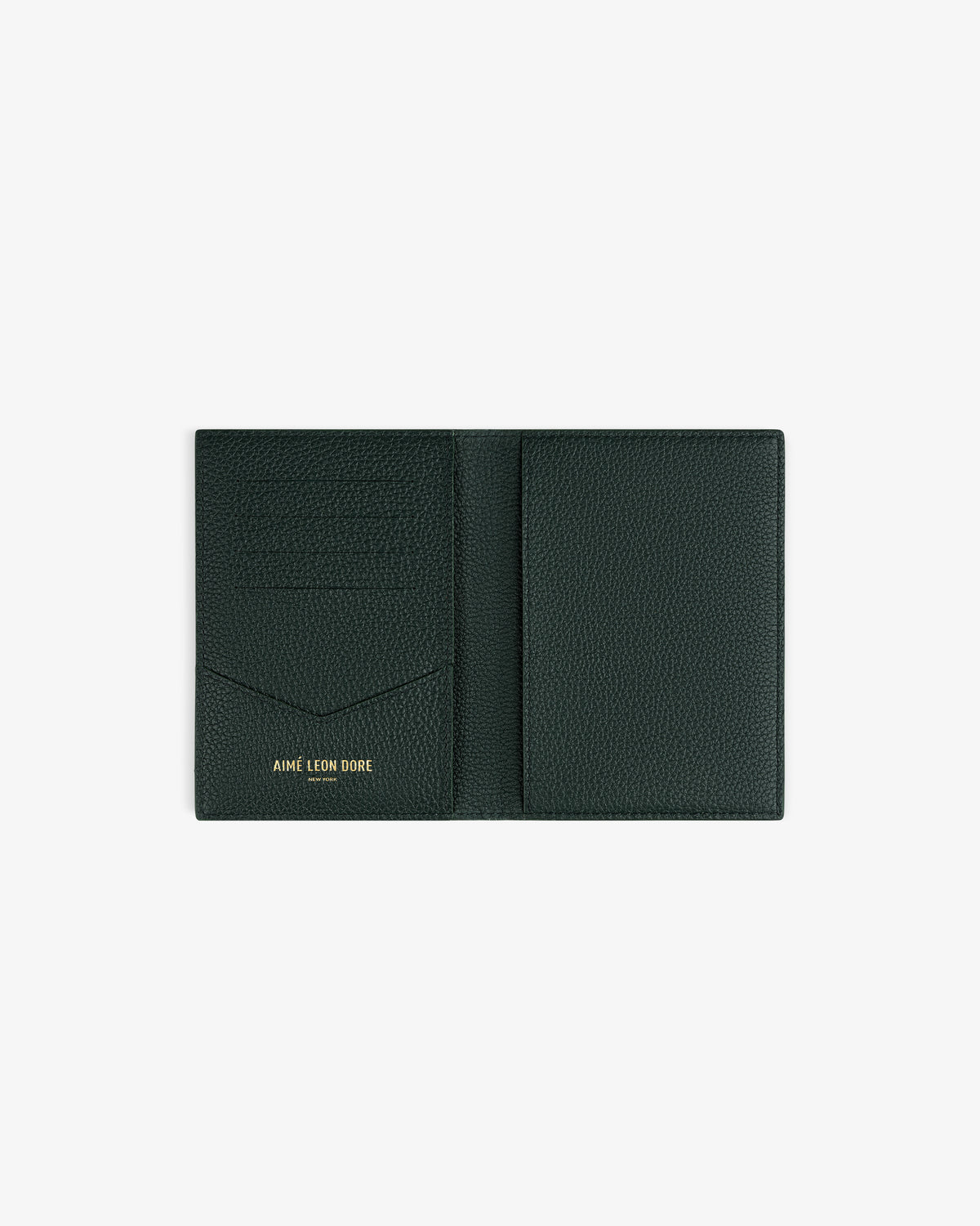 Open dark green Leather Passport Holder with “AIME LEON DORE” in gold on the left pocket, on white background.