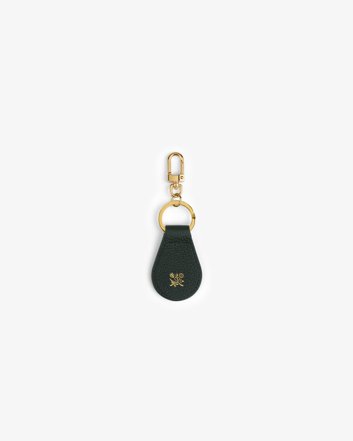 Leather Key Fob in dark green with gold hardware and a small gold flower emblem on the leather.