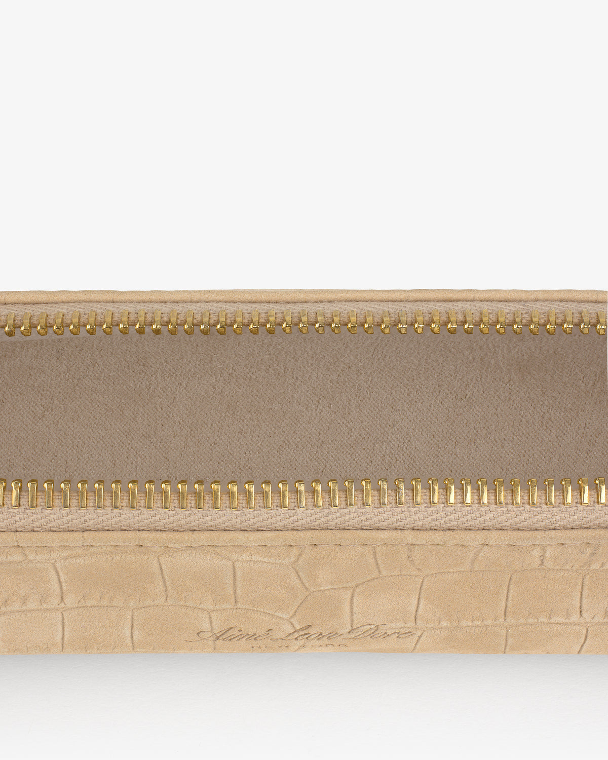 Close-up of an open Croc-Embossed Nubuck Pencil Case with a gold zipper and fabric lining.