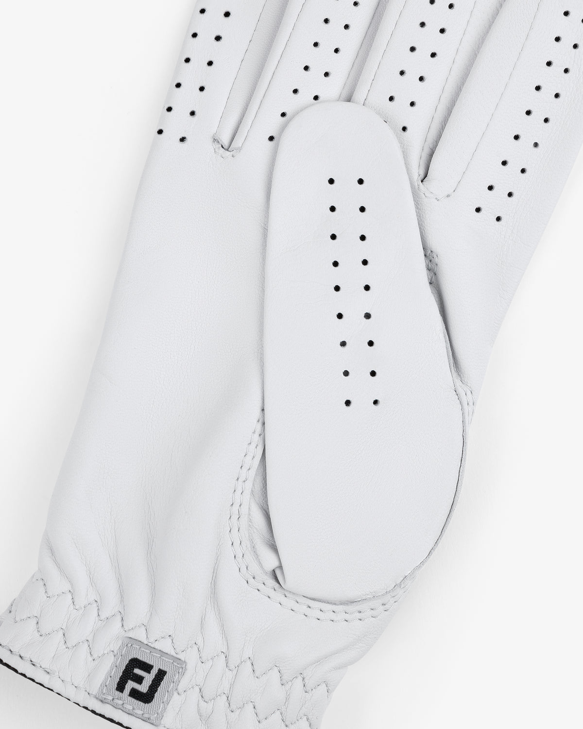 The ALD / FootJoy StaSof Heritage Glove (Right) is a white leather glove with perforations and an FJ cuff logo.