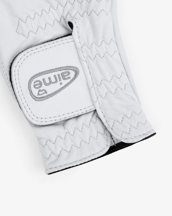 Close-up of the ALD / FootJoy StaSof Heritage Glove (Right) with "Aime" stitched upside down on the strap.