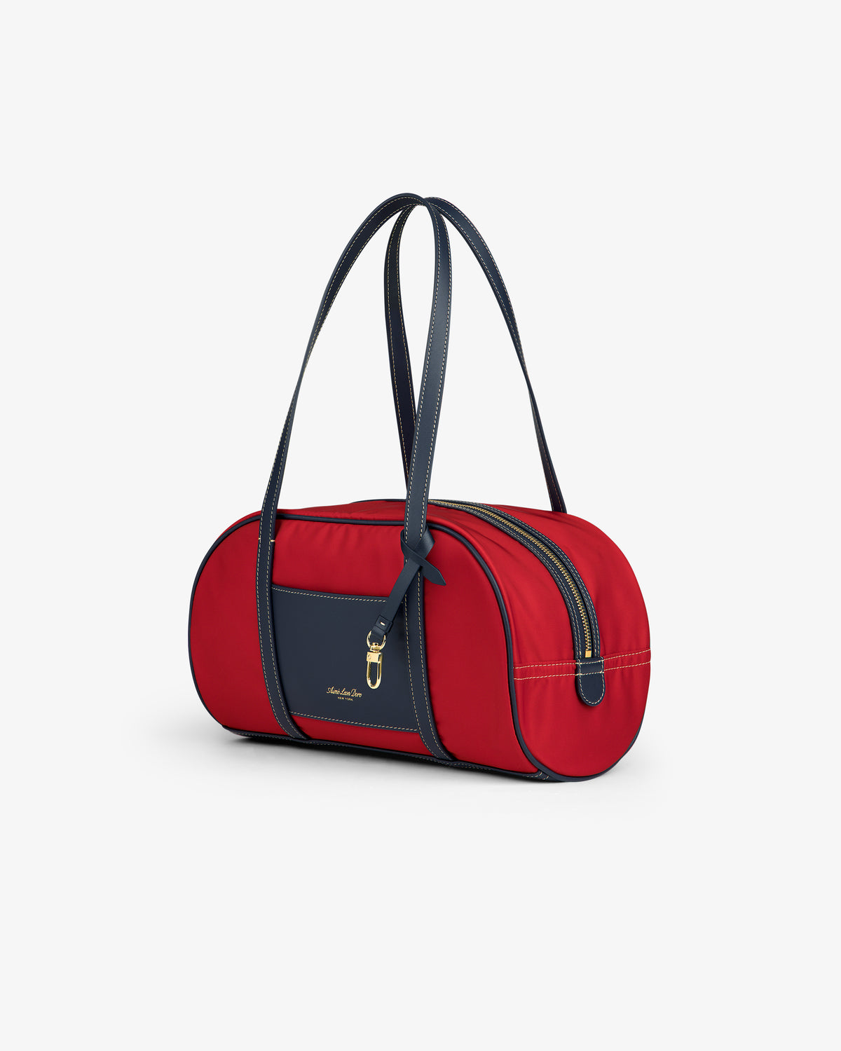 Mini Duffle Shoulder Bag: red barrel shape, navy handles, zipper & pocket, gold hardware, and logo.