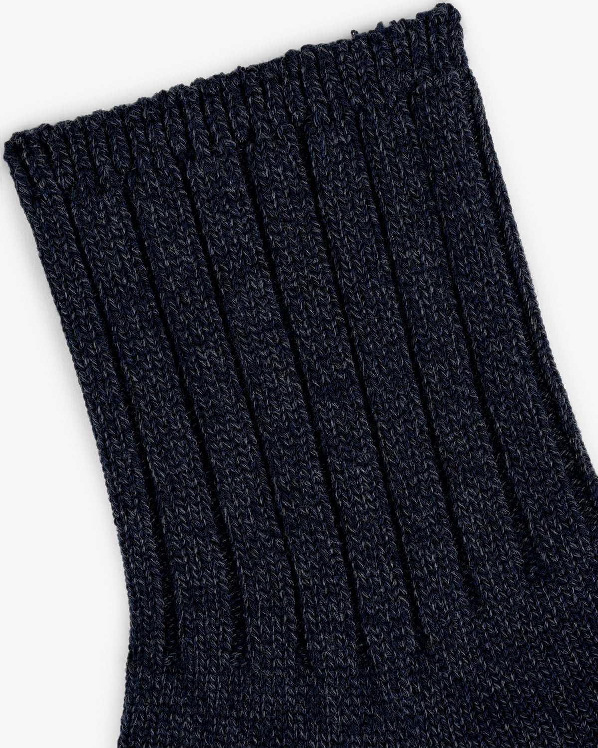 Close-up of the ribbed cuff on the Marled Quarter Sock in dark navy blue, highlighting its textured knit fabric.