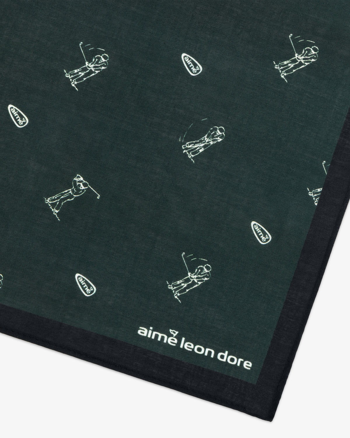 The ALD Golf Swing Bandana features white golfer prints, a corner logo, and black border.