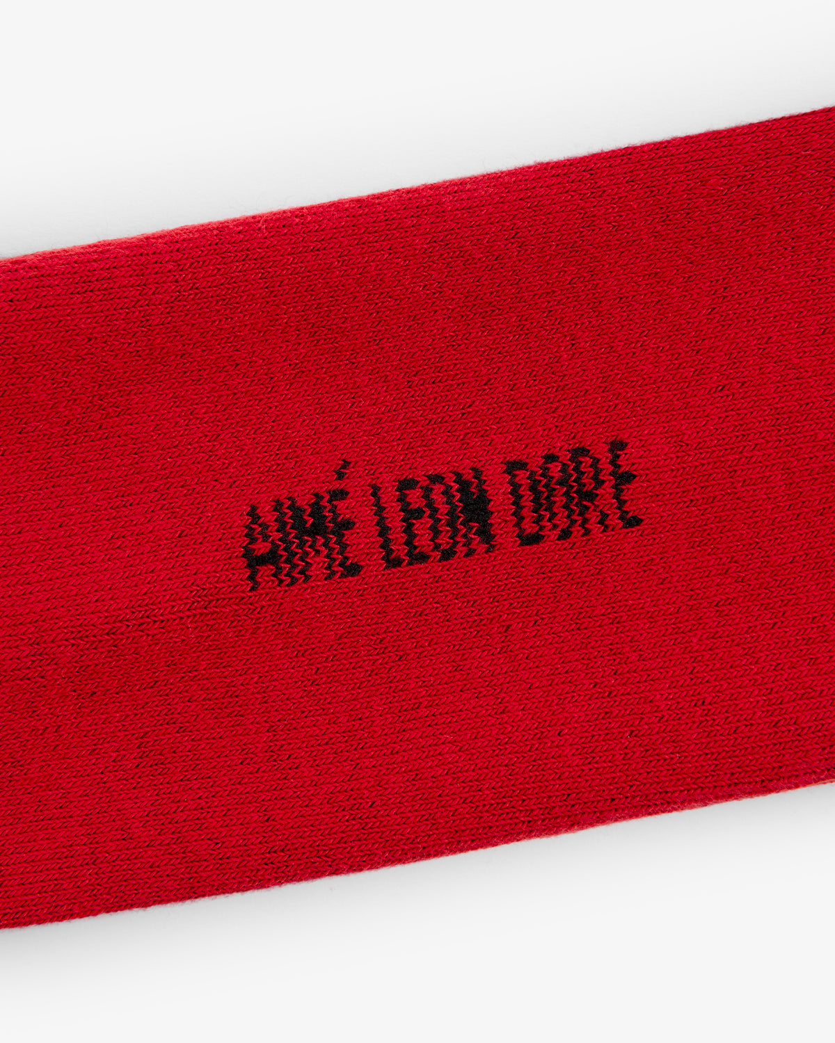 Red Crew Sock 3-Pack with AIMÉ LEON DORE in black pixelated text at the center.