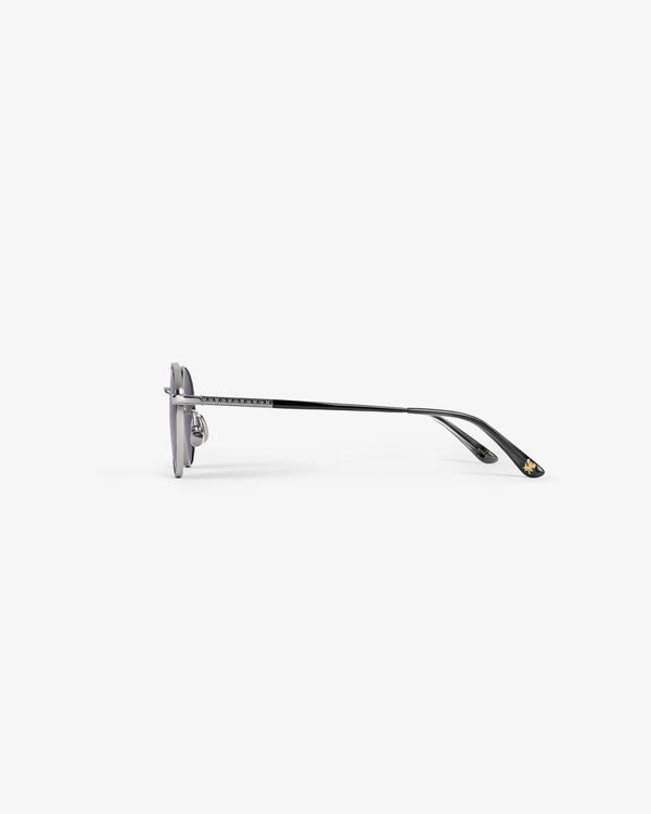 Side view of Giórgios Sunglasses in black metal with grey lenses and thin arms, on a plain white background.