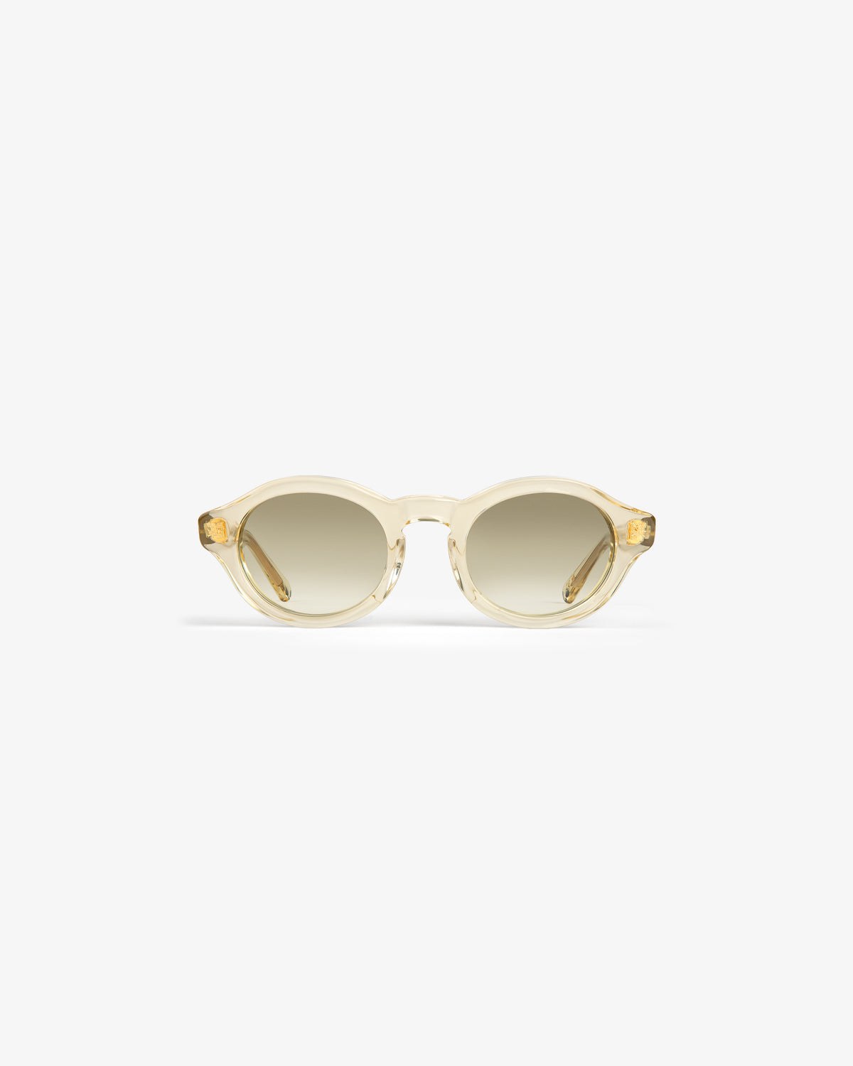 Onásis Sunglasses: Translucent, round light beige frames with gradient tinted lenses on a white background.