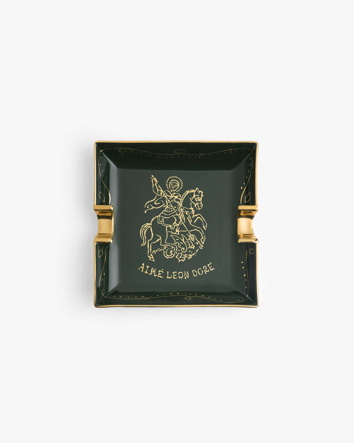 Saint George Ashtray: dark green square with gold trim, rider illustration, and AIME LEON DORE below.