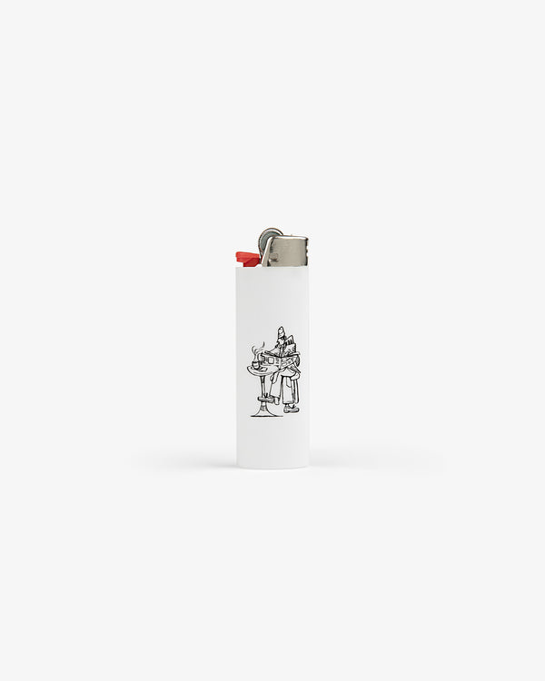 Caricature Lighter: white with a small black line drawing of two characters at a café table on the front.