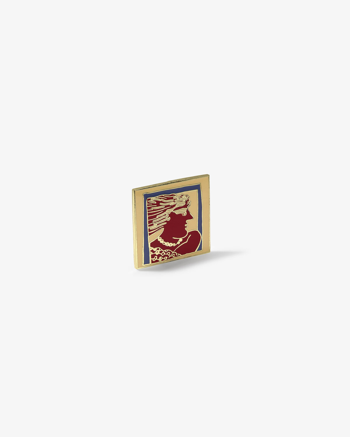 Graphic Pin: Square enamel pin with gold border, features red woman’s profile with flowing hair and jewelry.