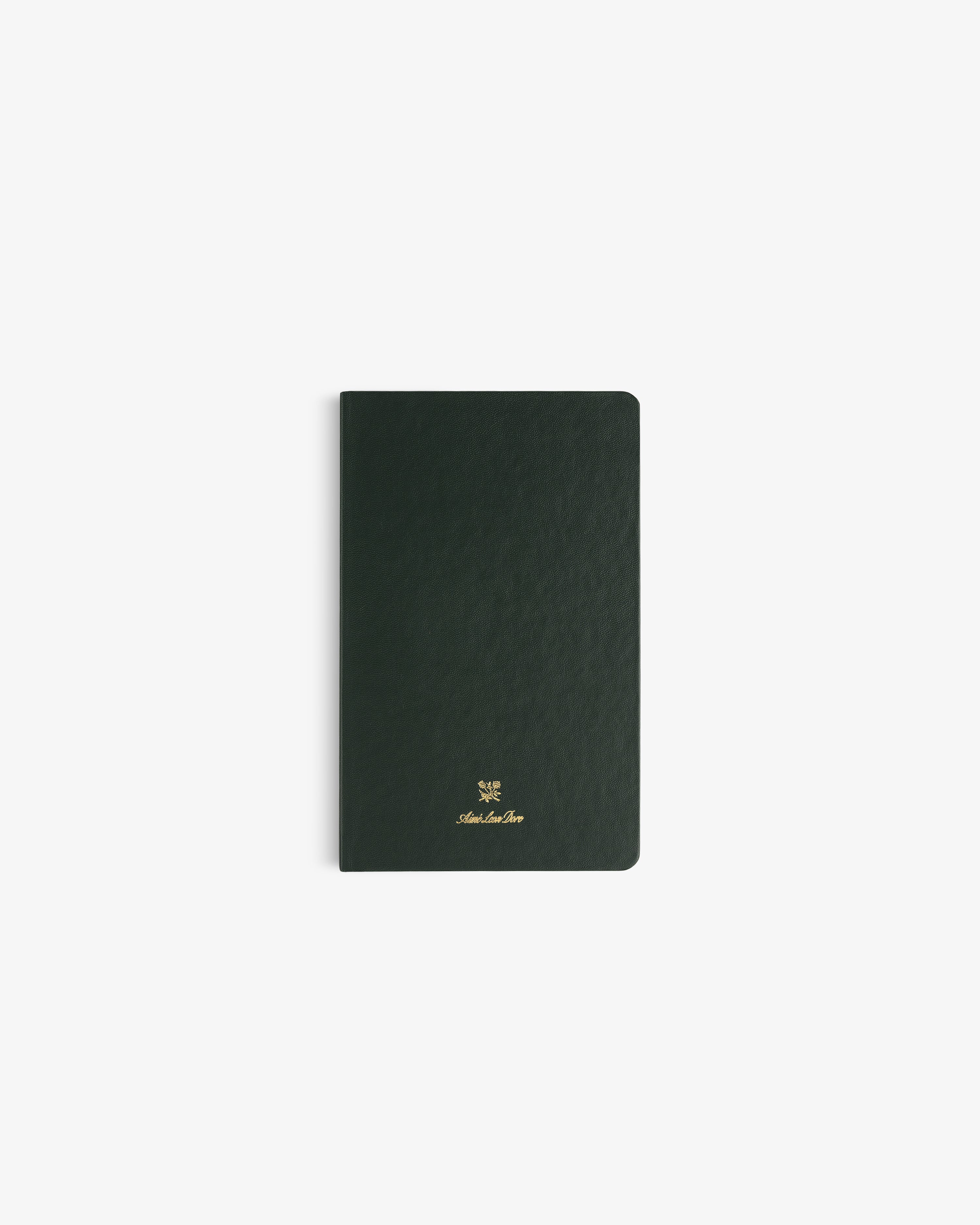 Dark green Crest Sketchbook, slim and rectangular, with gold foil emblem and text on the cover, on white background.