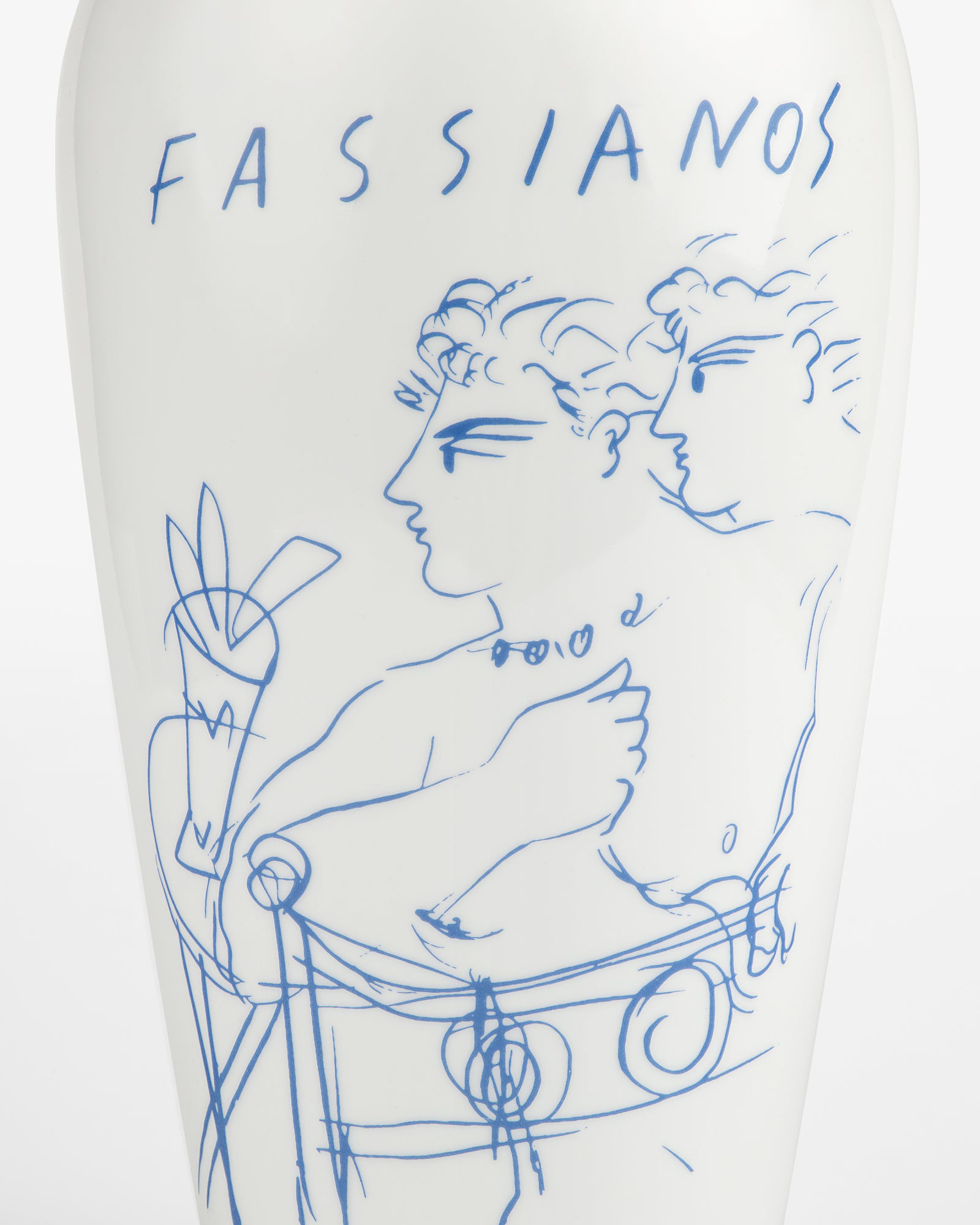 The Fassianos "Rendez-Vouz" Vase is white with blue line art of two figures and "FASSIANOS" at the top.
