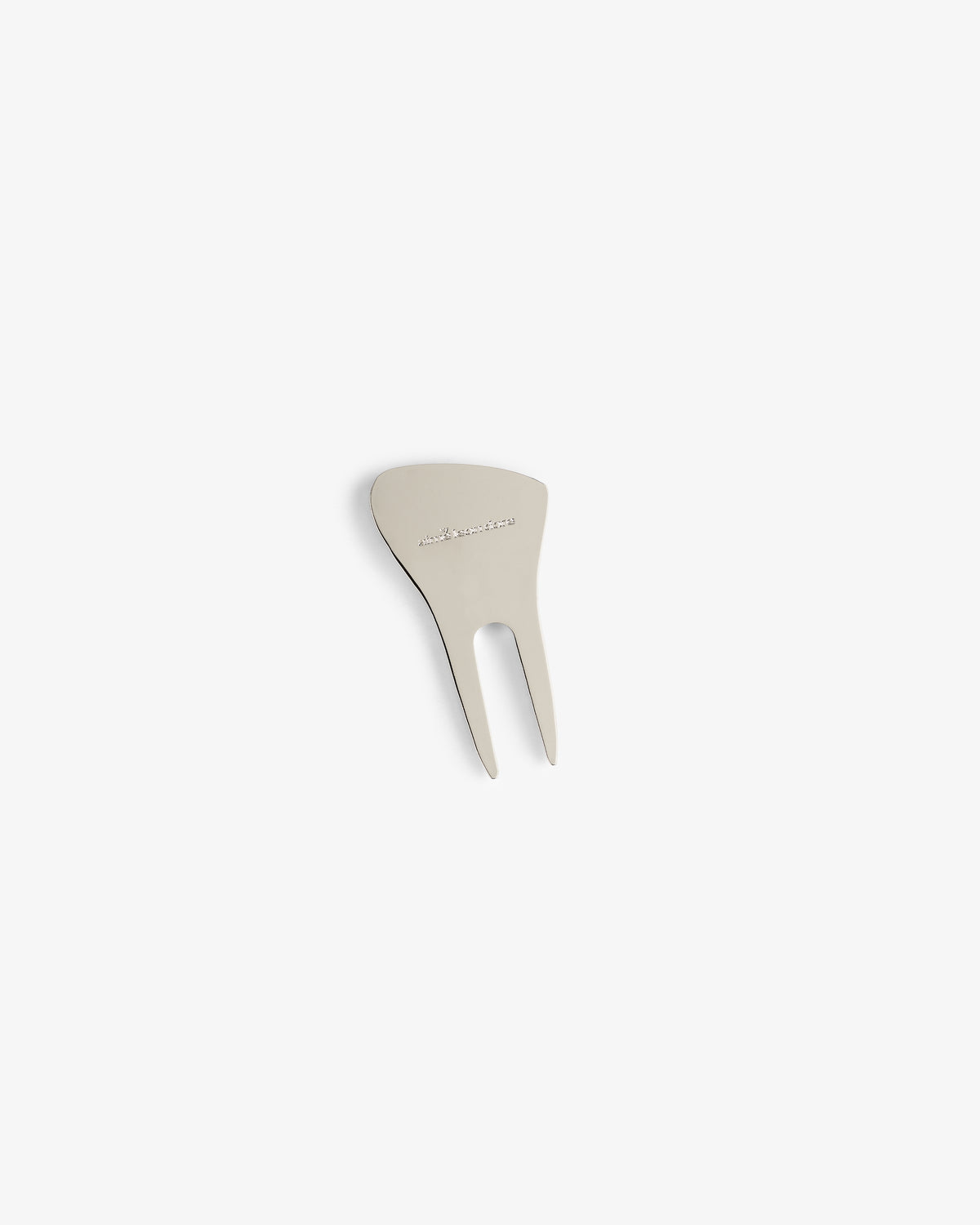 The ALD Golf Divot Tool is a metal, two-prong repair tool with engraved text on its flat top.