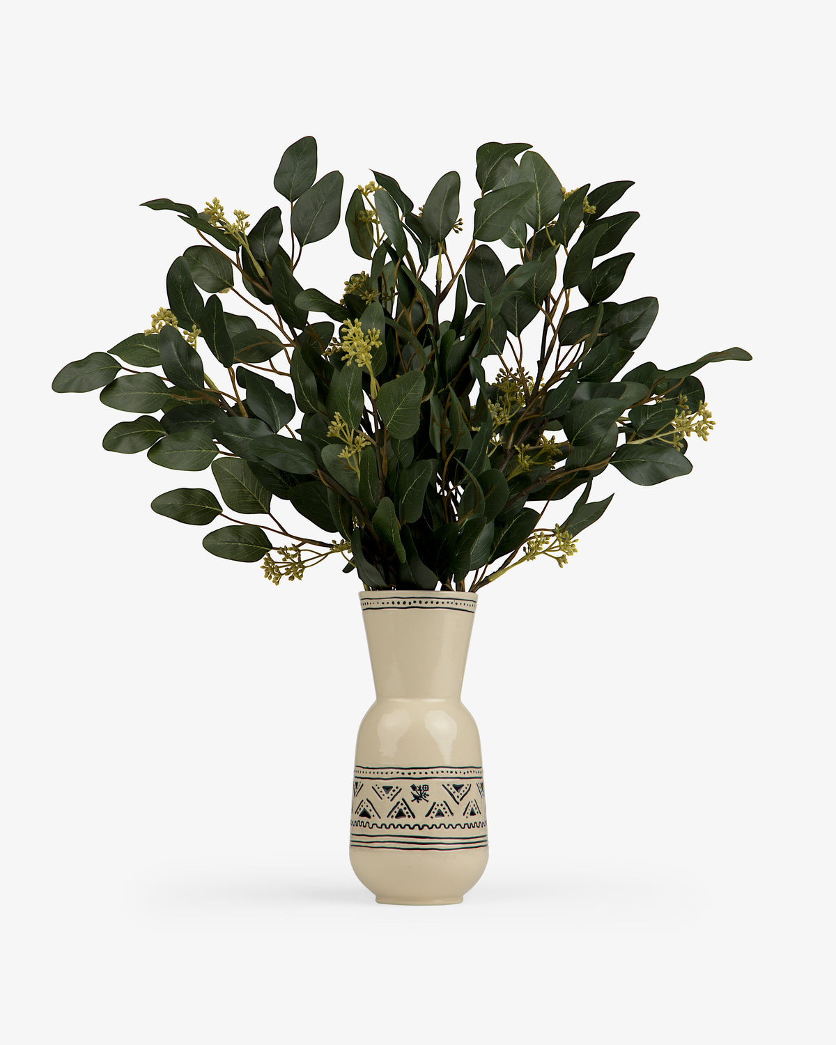 A cream-colored Textile Patterned Vase with green branches and small yellow flowers on a white background.