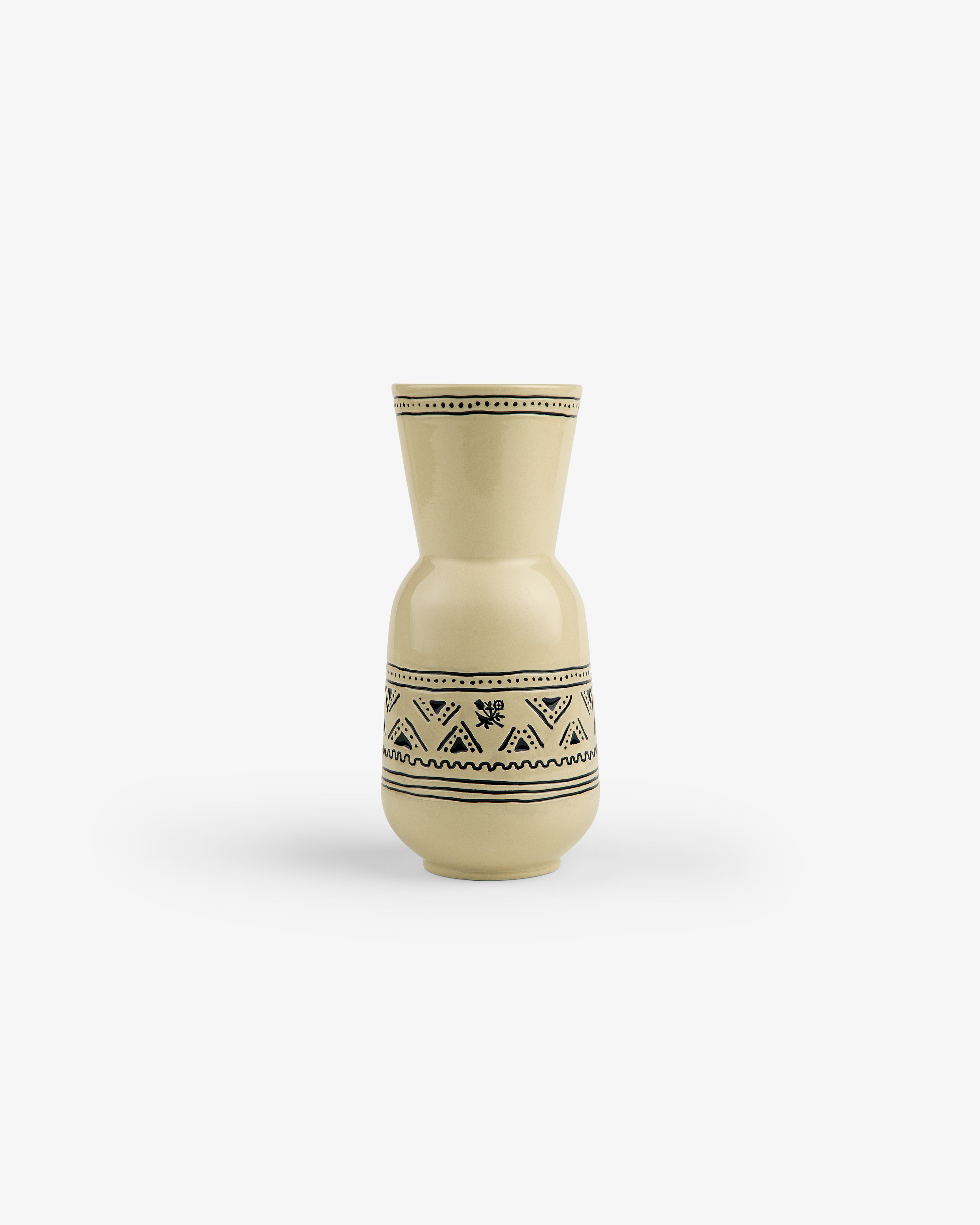 Textile Patterned Vase in beige ceramic with black geometric and floral designs on white.