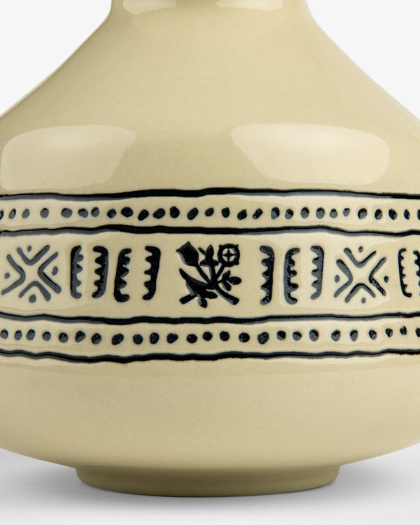 Textile Patterned Bud Vase in beige ceramic with black geometric and floral patterns around the middle.