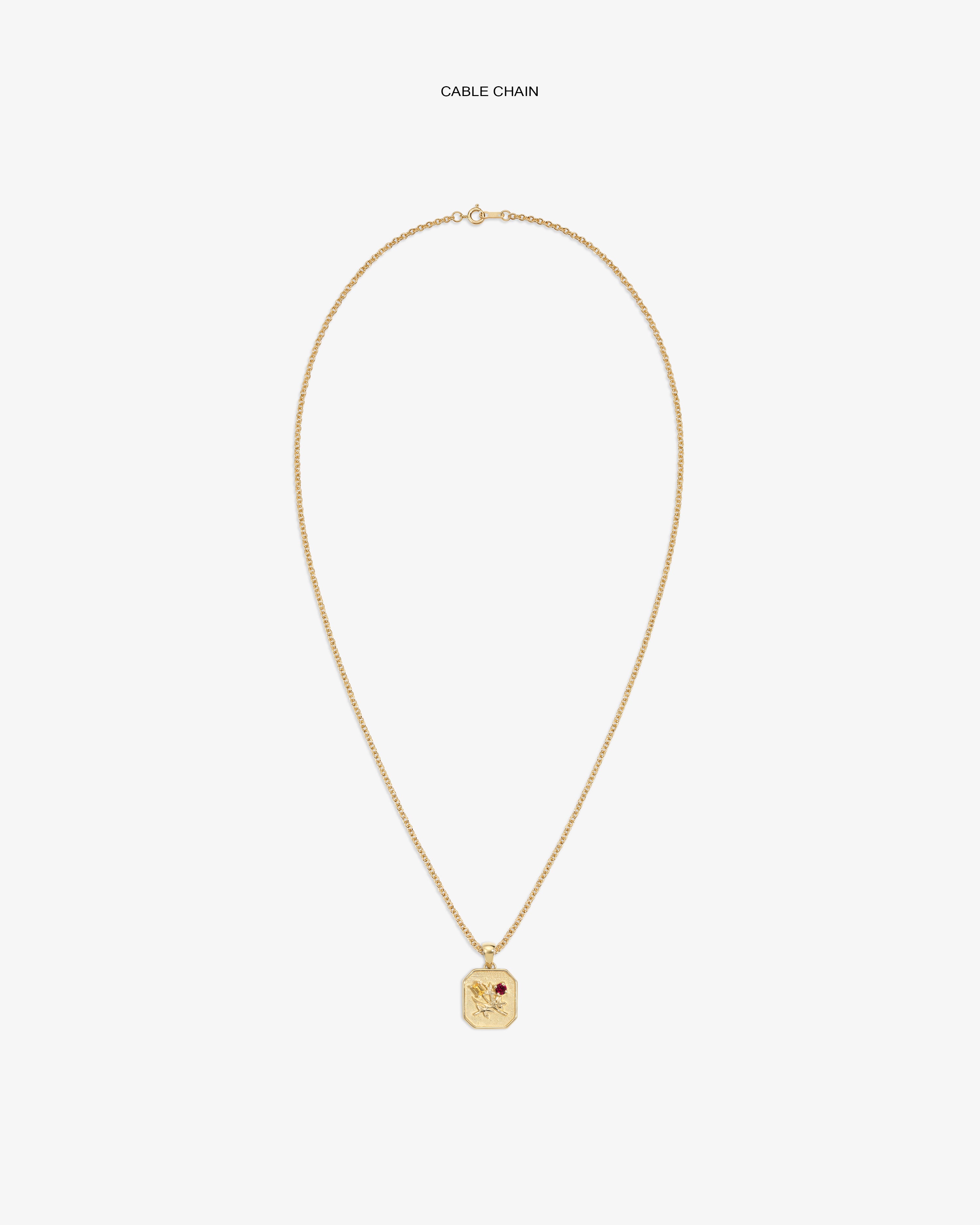14Kt Gold Queens Crest Relief Pendant on a cable chain, featuring an engraved design and a small red stone detail.