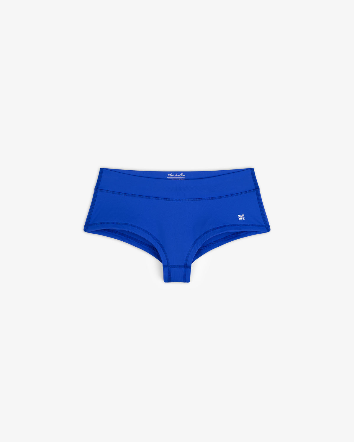 Crest Swim Short in bright blue, women's boyshort style, laid flat showing small left-hip logo on white background.