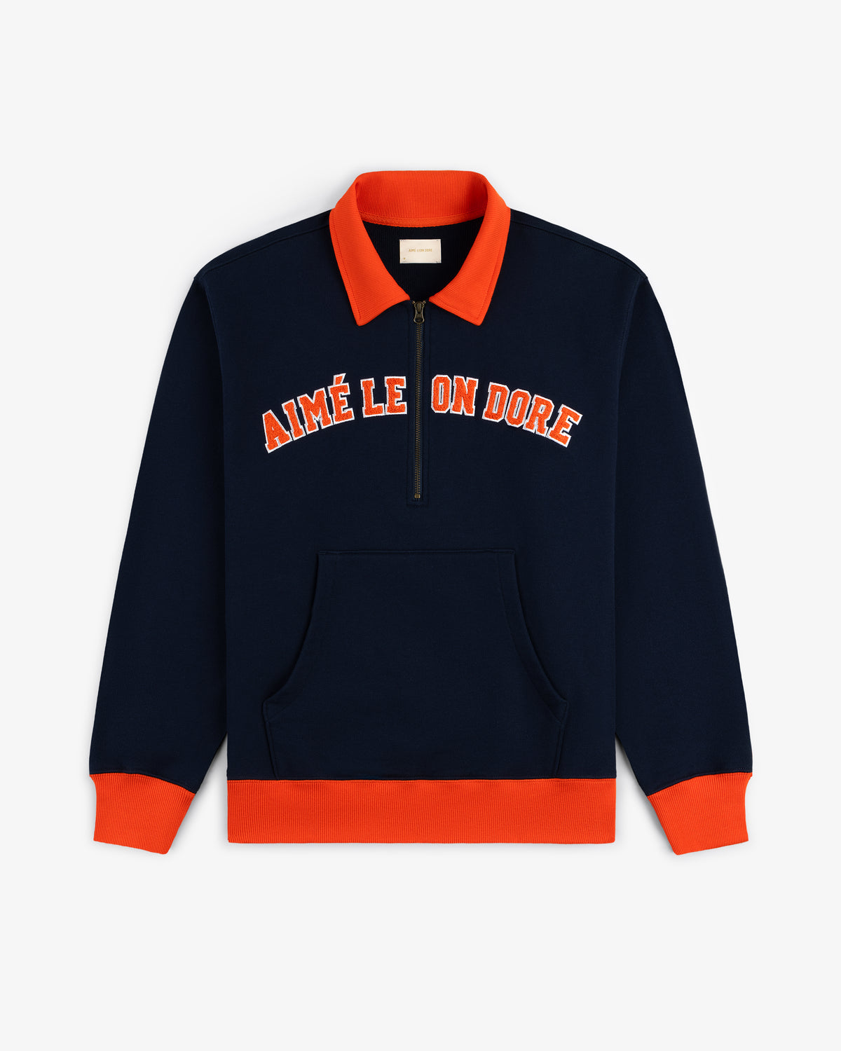 Collegiate Quarter Zip Pullover in navy with orange accents, front pocket, half-zip, and AIMÉ LEON DORÉ chest text.