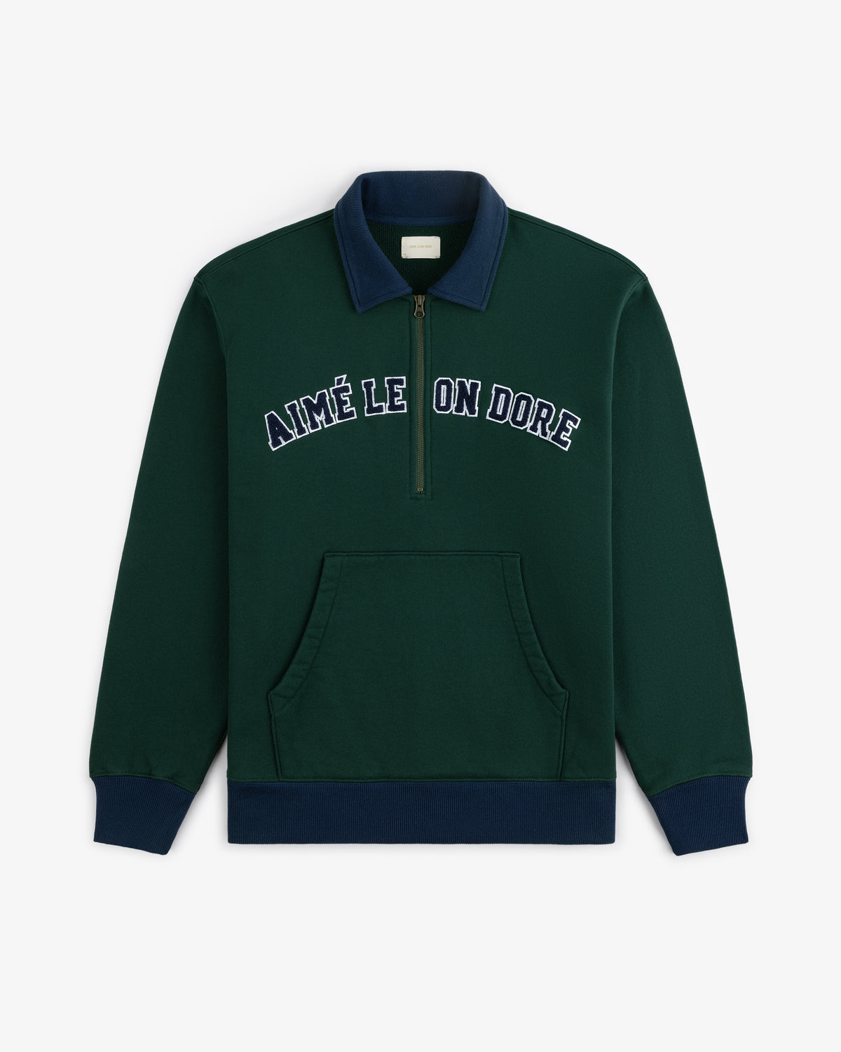 Collegiate Quarter Zip Pullover in dark green with navy collar, cuffs, and AIMÉ LEON DORE text across the chest.