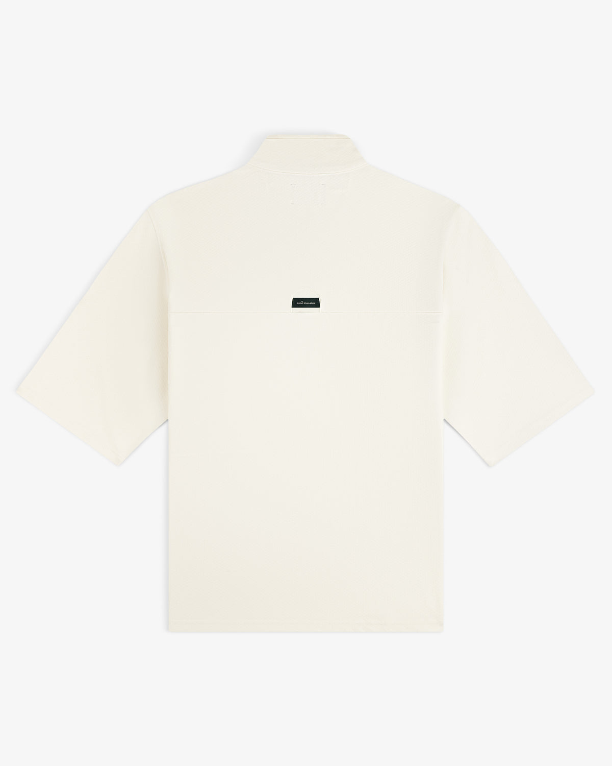 Back view of the ALD Golf Quarter Zip Pullover in off-white with a small dark label at the upper center.