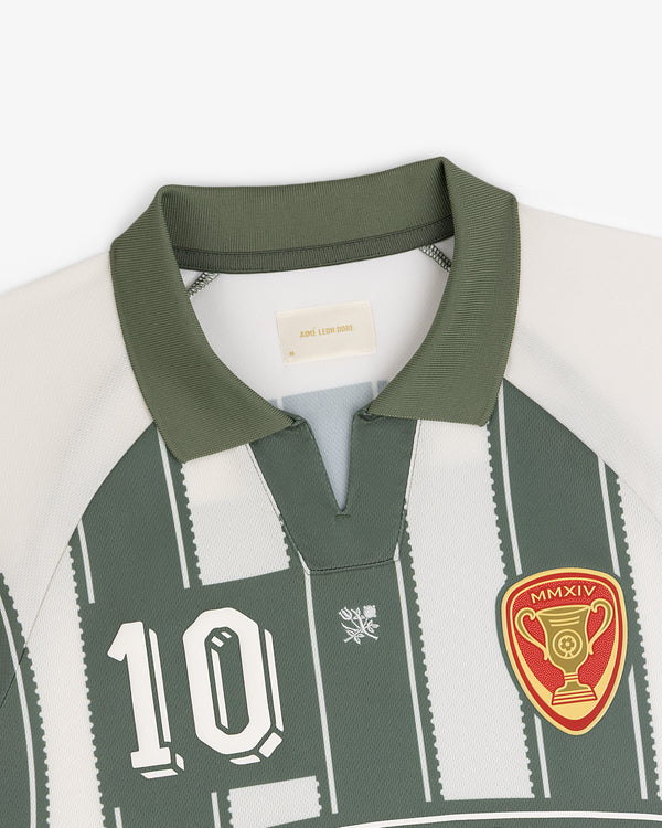 Aimé Cup Soccer Jersey: green/white, number 10, trophy patch, short collar with V-notch.