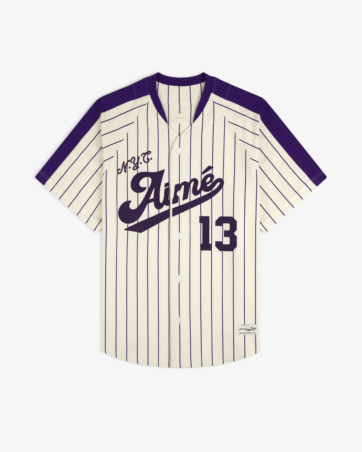 Cream and purple pinstriped Aimé Baseball Jersey with “Aimé” and 13 on the front.