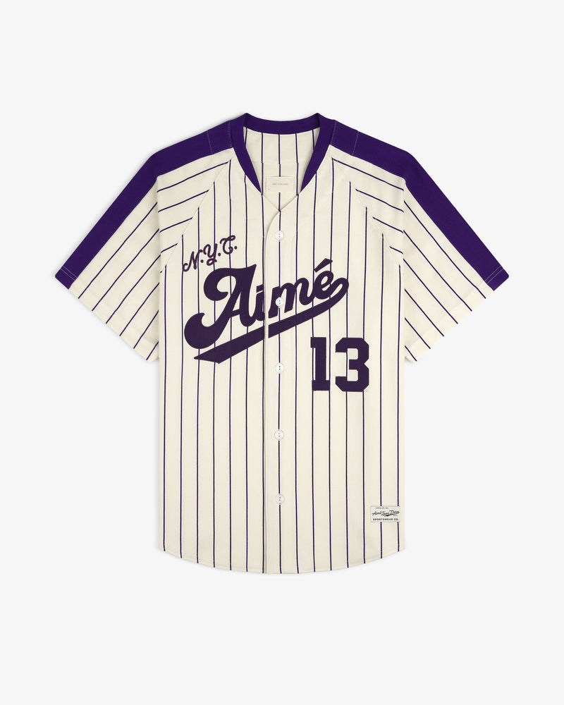 Cream and purple pinstriped Aimé Baseball Jersey with “Aimé” and 13 on the front.
