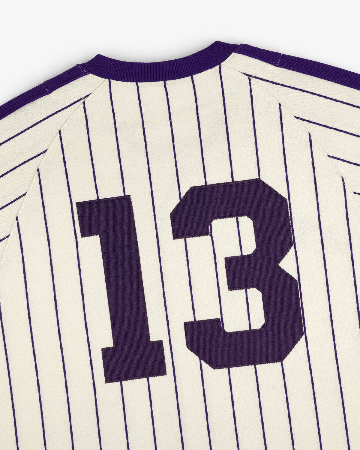 Aimé Baseball Jersey: white with thin navy stripes and large dark number 13 on the back.