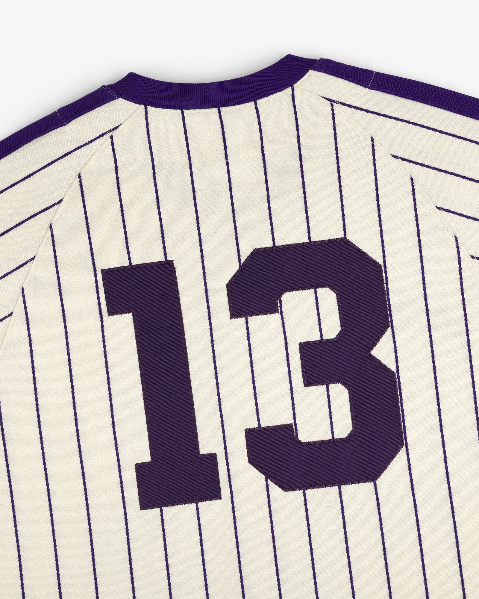 Aimé Baseball Jersey: white with thin navy stripes and large dark number 13 on the back.