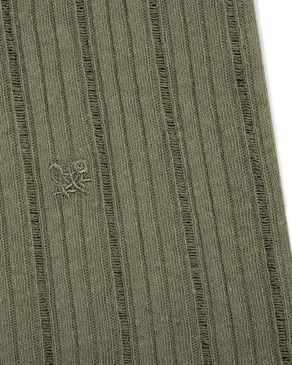 Close-up of olive green Drop Needle Tank Top's ribbed fabric with a small embroidered logo of two abstract shapes.