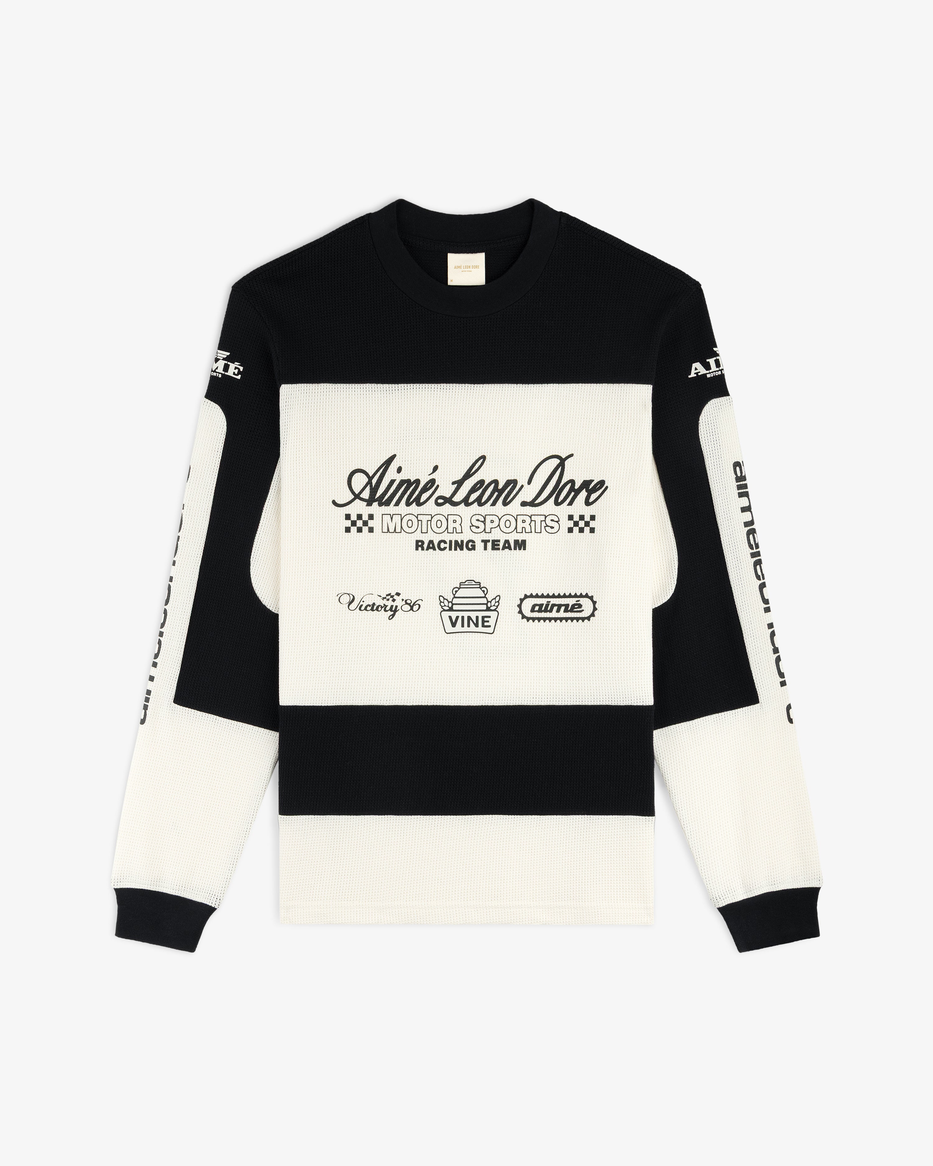 The Long-Sleeve Mesh Enduro Tee features racing logos and Aimé Leon Dore Motor Sports Racing Team on the front.