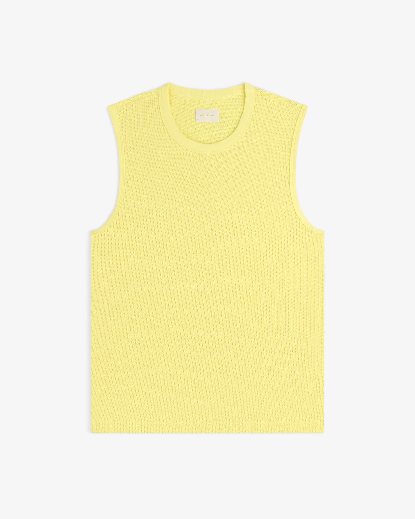 Mesh Muscle Tank in light yellow, sleeveless and ribbed, displayed flat on a white background.