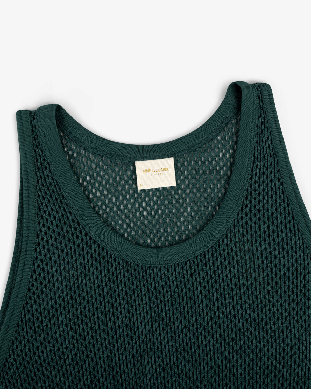 Mesh Tank Top in dark green with a round neckline and visible inner collar label.