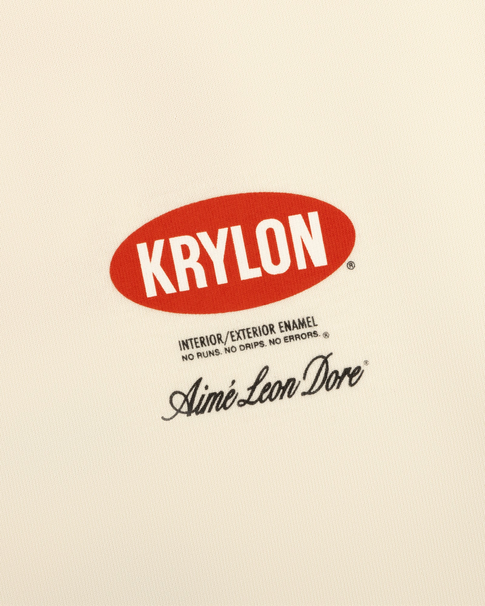 Krylon Logo Tee features a red KRYLON logo above "Interior/Exterior Enamel" and Aimé Leon Dore text on beige.