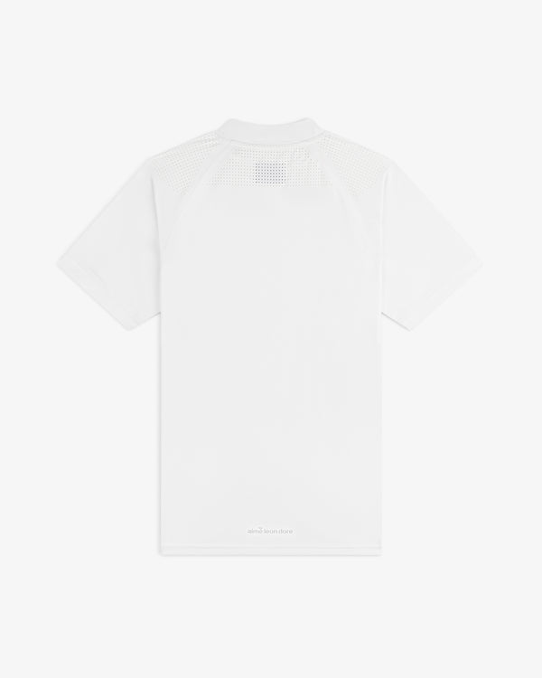 Back of the ALD Golf Performance Tee: plain white, mesh on upper shoulders, subtle text near the hem.