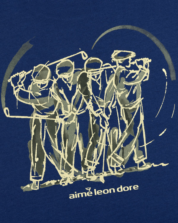 Line drawing of four golfers swinging clubs above “Aime Leon Dore” text on the blue ALD Golf Swing Tee.