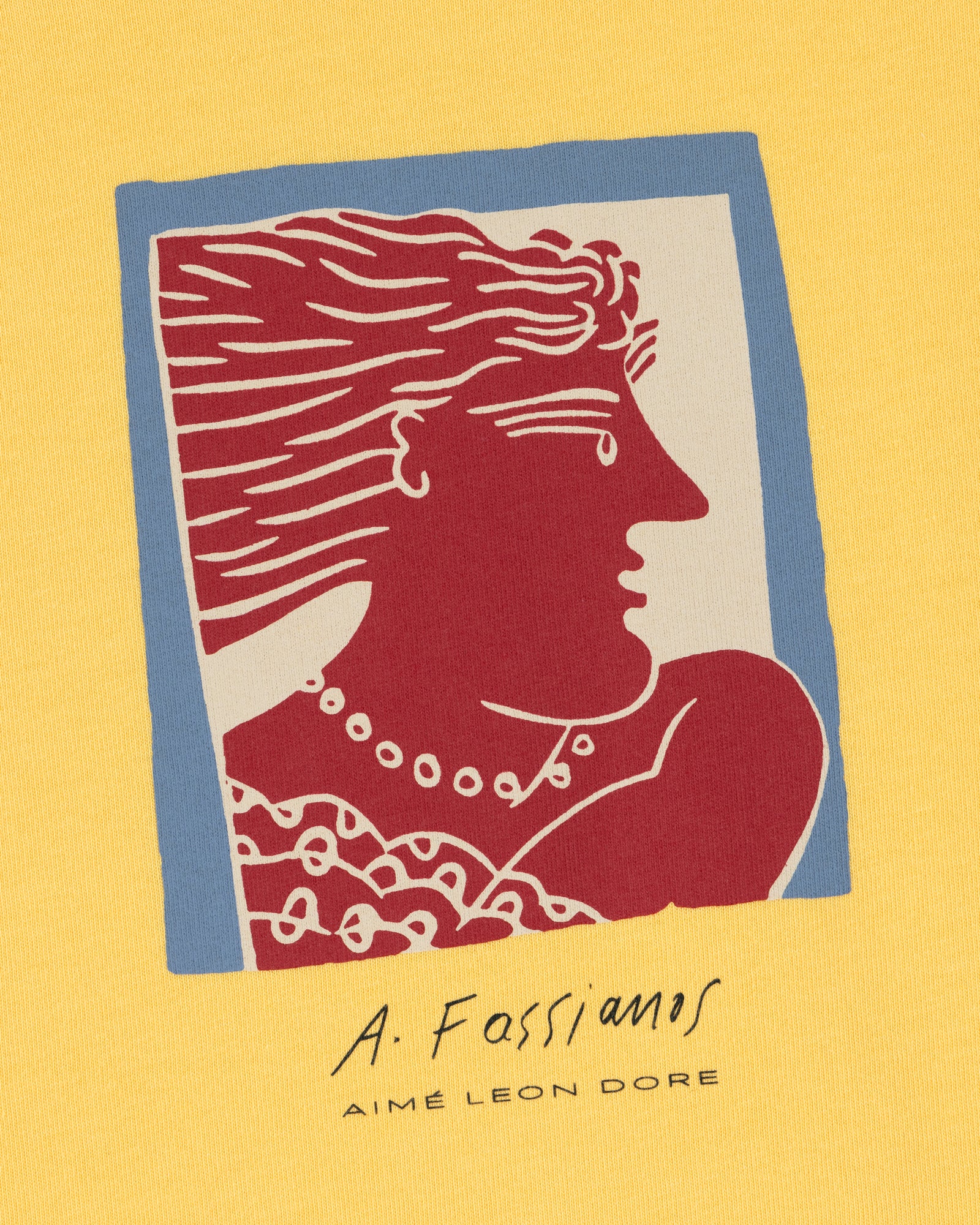Fassianos Portrait Tee: Red and white profile illustration on yellow with A. Fassianos and AIMÉ LEON DORE text below.